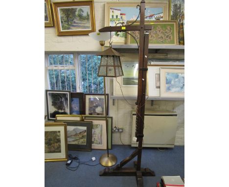 A 1930s oak lantern standard lamp with adjustable column, and a metal uplighter 