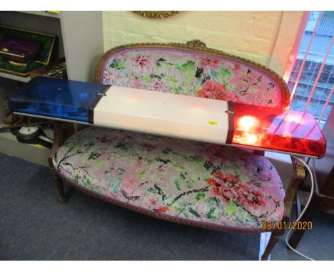 An American police car roof light, converted to an electrical prop display light 
