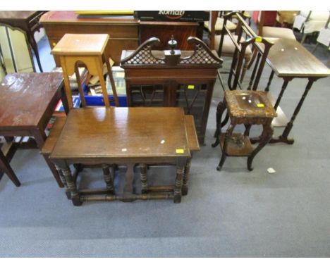 A mixed selection of small furniture to include an oak Ercol style nest of three occasional tables, a carved two tier plant t