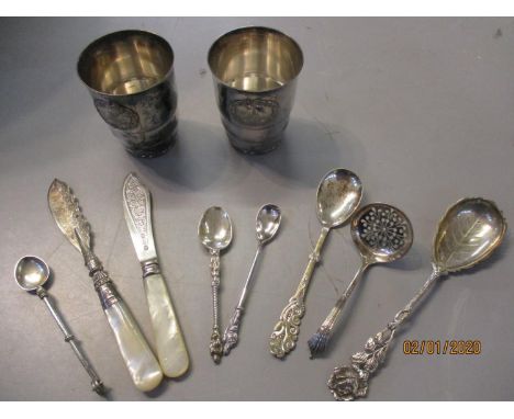 A small quantity of silver and white metal to include a pair of continental white metal cups. Location Porters 