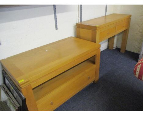 A  modern light oak sideboard having three cupboard doors and standing on block feet, 34" h x 71"w along with a modern light 