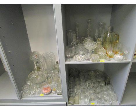 A quantity of glassware to include three Victorian cut and engraved shaft and globe decanter and stoppers, a cut glass table 