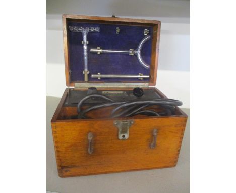 An Everray violet light massager in a mahogany case, early 20th century 