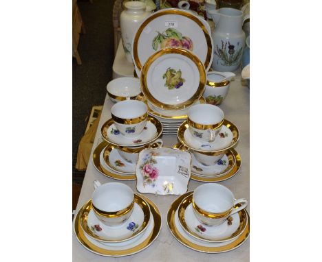 A Czechoslovakia tea service, for six, printed with fruit, gilt border;  etc 