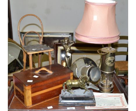 A miniature Bentwood chair;  an Art Nouveau style figure of a scantily clad lady;  a brass table lamp; brass miners lamp; a m