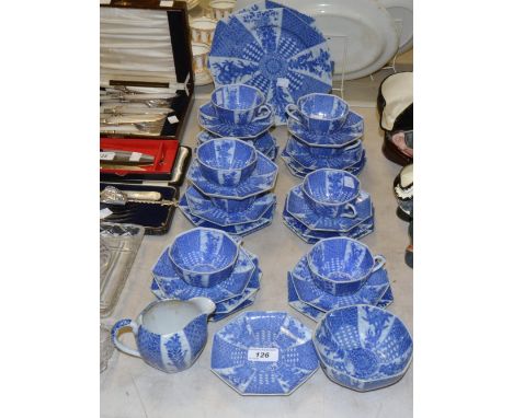 A Chinese export ware blue and white tea service for eight including two bread plates. side plates, jug, sugar bowl; etc