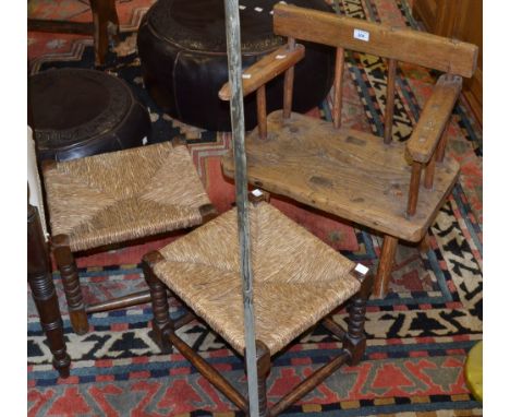 Miniature furniture - a rustic oak bench; a pair of rush seated foot stools
