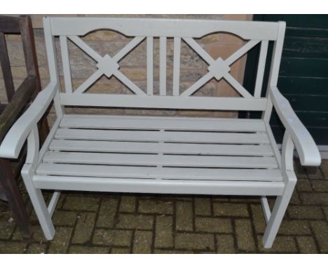 A lime painted garden bench