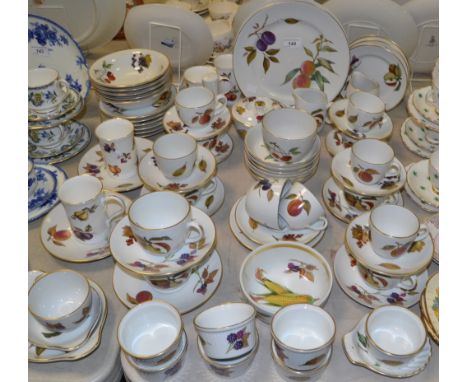 A Royal Worcester Evesham pattern part dinner and tea service