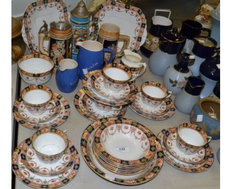 An early 20th century Coronation ware, Sydney pattern, part tea service;  beer steins;  etc 