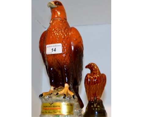 A Beswick Golden Eagle decanter modelled in 1969 for Gleneagles Scotch Whisky, printed marks;  another, smaller (2)