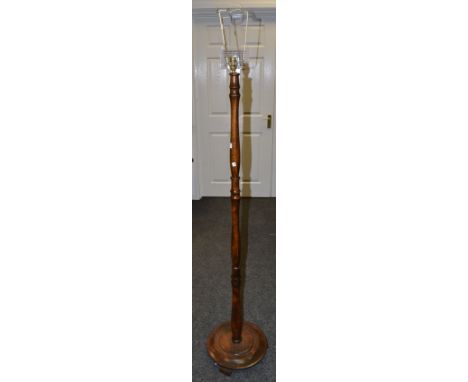 An oak turned standard lamp