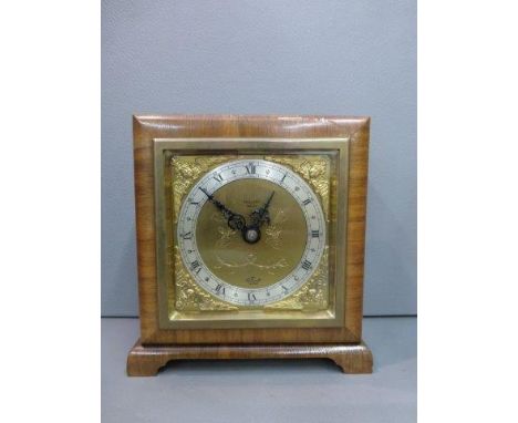 A decorative mantle clock marked to the dial: Mallory of Bath. 