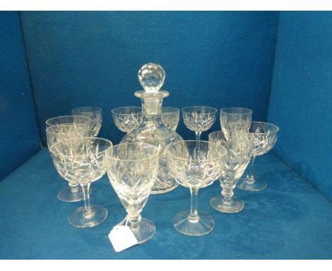 A cut glass decanter and two sets of six Stuart drinking glasses. 