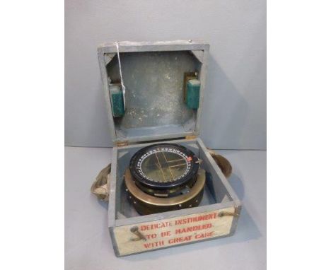 A cased military compass Ref. No. 6A/1672 Type P.11. No. 35644B, in original carrying case. 