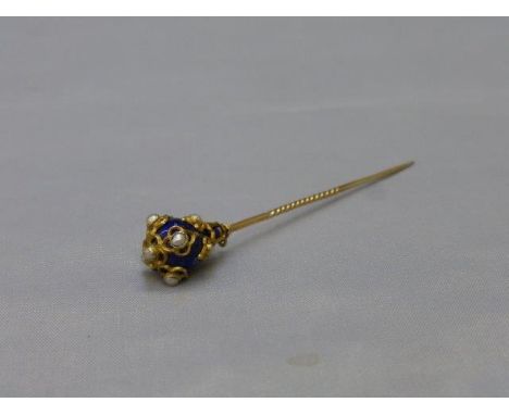 A fine gold, enamel and seed pearl stick pin. 