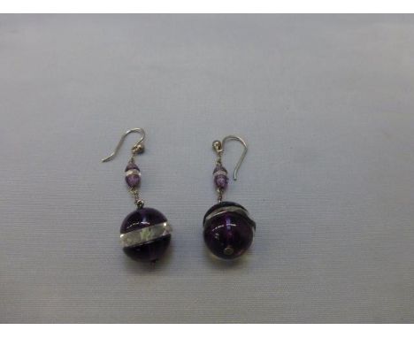 A pair of amethyst and crystal drop earrings. 