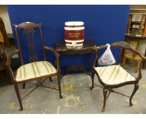 An Edwardian mahogany foldover tea table, two Edwardian chairs and a large ceramic Mendoza sherry barrel with tap.