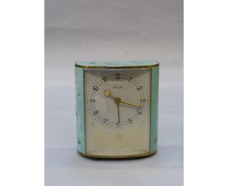 An unusual German enamel cased bow fronted musical mantle clock marked to the dial Kenzle, playing Lily Marlane.
