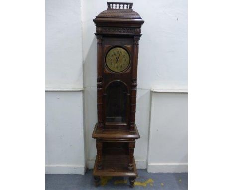 A late 19th/early 20th Century Continental walnut longcase clock with three train weight driven movement climbing on the quar