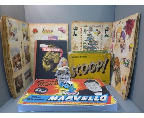 Two 1950s scrap albums, an Andy Pandy puppet and two boxed games: Marvello and Scoop. 