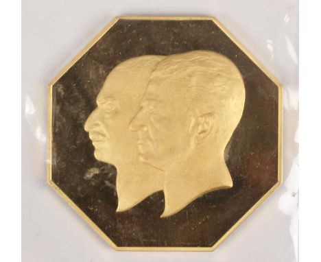 A Republic of Iran gold octagonal medallion commemorating the 50th Anniversary of Bank Melli and the Pahlavi Dynasty 1941-197