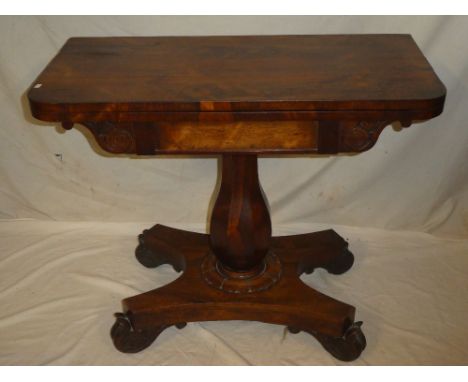 A 19th century rosewood rectangular turnover top card table with baize lined playing surface on tapered column and plateau ba