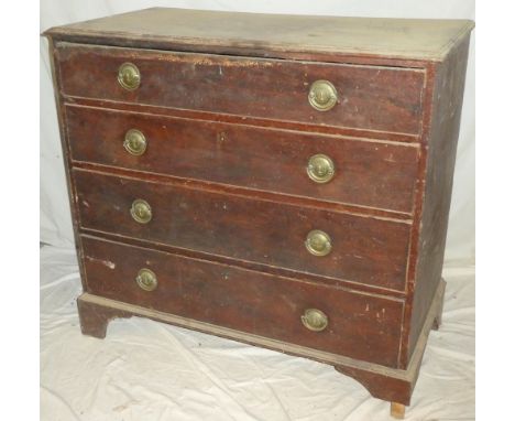 An early to mid 19th century stained pine chest of four long graduated drawers with brass ring handles on bracket feet