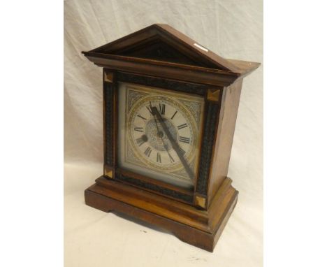 A German bracket clock with painted square dial in polished walnut and ebonised case