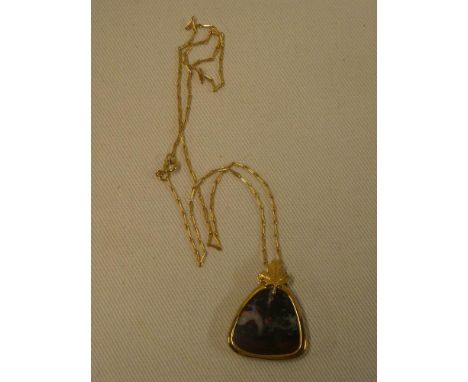 A 9ct gold pendant necklace set boulder opal (with original receipt dated 2012)