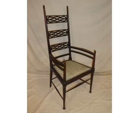 Edwardian Art Nouveau mahogany ladder back carver armchair with pierced rail back and upholstered seat on turned tapered legs