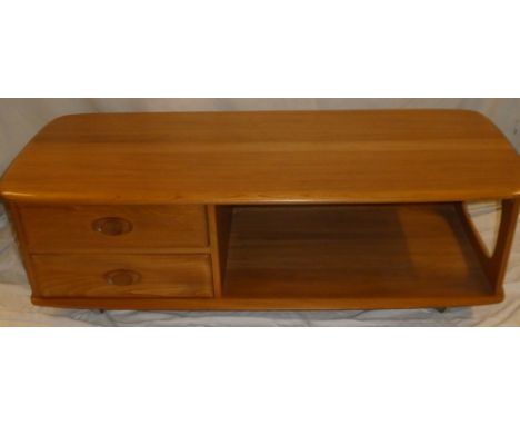 A good quality Ercol light elm rectangular coffee table with two small drawers and open recess 49" long