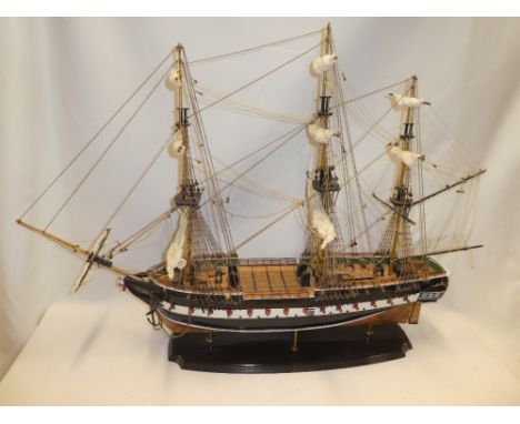 A wooden scale built model of a three-masted gun ship "Trincomalee" 38" long