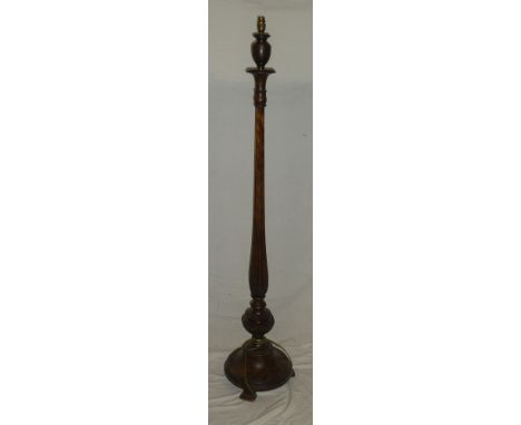 A 1920/30's stained wood standard lamp with hexagonal tapered stem and circular base