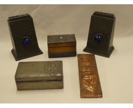 A pair of Art Deco angular pewter-coated bookends with blue ceramic raised panels, pewter clad rectangular card case and a si