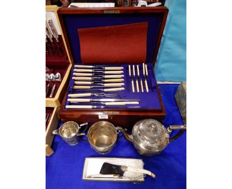A three drawer canteen of matched EPNS ivorine-handled cutlery, in the Hanoverian pattern, a three piece EPNS Zodiac pattern 