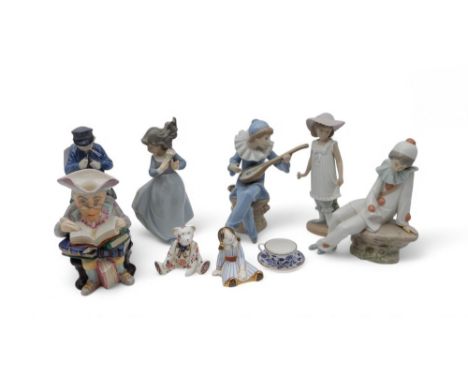 A collection of figures including a Royal Copenhagen boy, Nao's, Wedgwood toby jug, two Royal Crown Derby paperweights etc Co