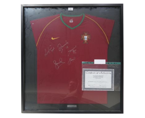 A 2006-08 Portugal Home shirt, signed by Ronaldo, Figo, Deco, Eusebio and Simao; framed under glass, measuring approx. 88cm x