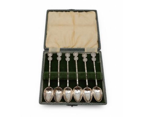 A cased set of six Chinese export silver teaspoons, the bowls initialled 'F', 71gms Condition Report:Available upon request
