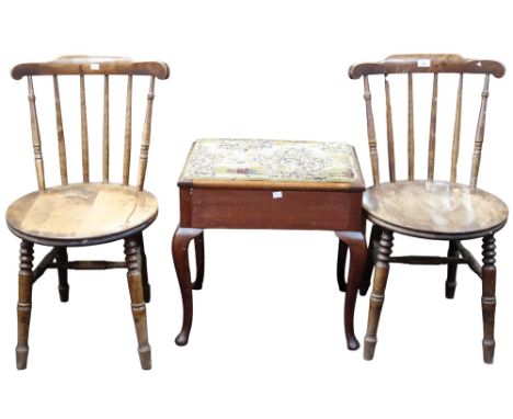 A lot comprising a pair of early 20th century beech framed spindle back kitchen chairs, 82cm high and an upholstered piano st