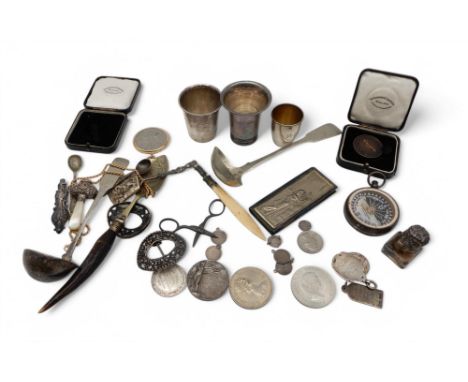 A Norwegian silver shot cup, marked 830S, Torgersen,&nbsp; another marked 830S, inscribed 'Sundre Hotel', a smaller example m