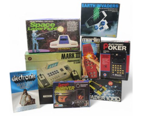 Vintage electronic games, comprising CGL Earth Invaders, and Galaxy Invader 1000, Palitoy Merlin and Demon Driver, Invicta El
