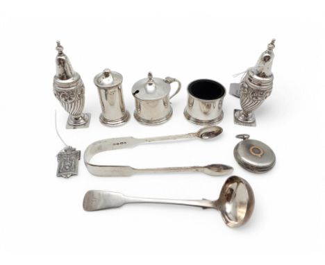 A collection of silver including a pair of Victorian silver casters, by H. Bros, Birmingham, a pair of Georgian silver sugar 
