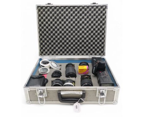Cameras, lenses and accessories, to include a Bell &amp; Howell 1:4.5 80-205mm Macro lens, RMC Takina 35-105mm 1:3.5-4.3 and 