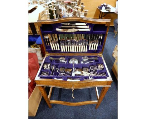 A mahogany canteen of stainless steel ivorine handled cutlery, most pieces by Walker &amp; Hall, 108 pieces (incomplete) with