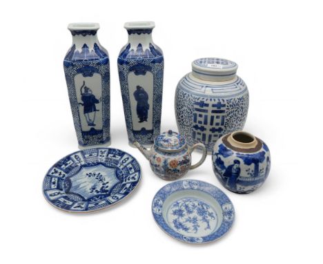 A pair of Chinese blue and white long square form vases decorated with figures, a lidded blue and white ginger jar, a smaller