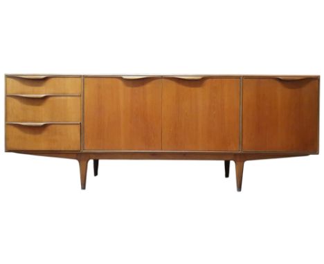 A mid 20th century teak Tom Robertson for McIntosh of Kirkcaldy "Dunvegan" sideboard with pair of central cabinet doors flank
