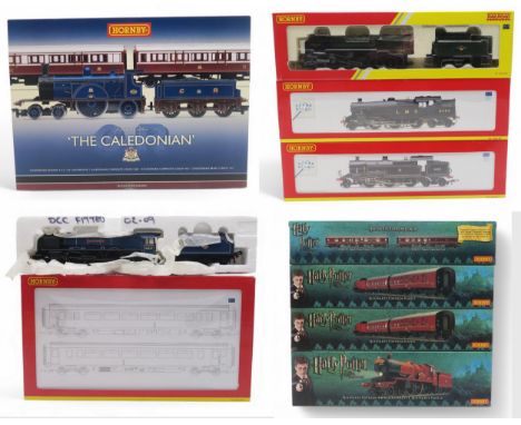 A boxed Hornby 00-gauge R2610 "The Caledonian" Limited Edition train pack; R2785 BR Green 9F Evening Star No. 92220, R2730 LM