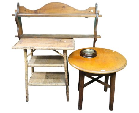 A lot comprising a 20th century three tier bamboo and rattan occasional table, circular topped occasional table, two tier wal