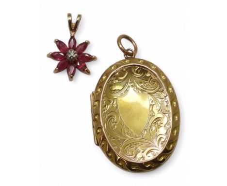 A 9ct gold ruby flower pendant and a 9ct gold locket pendant, weight combined 6.5gms Condition Report:Available upon request